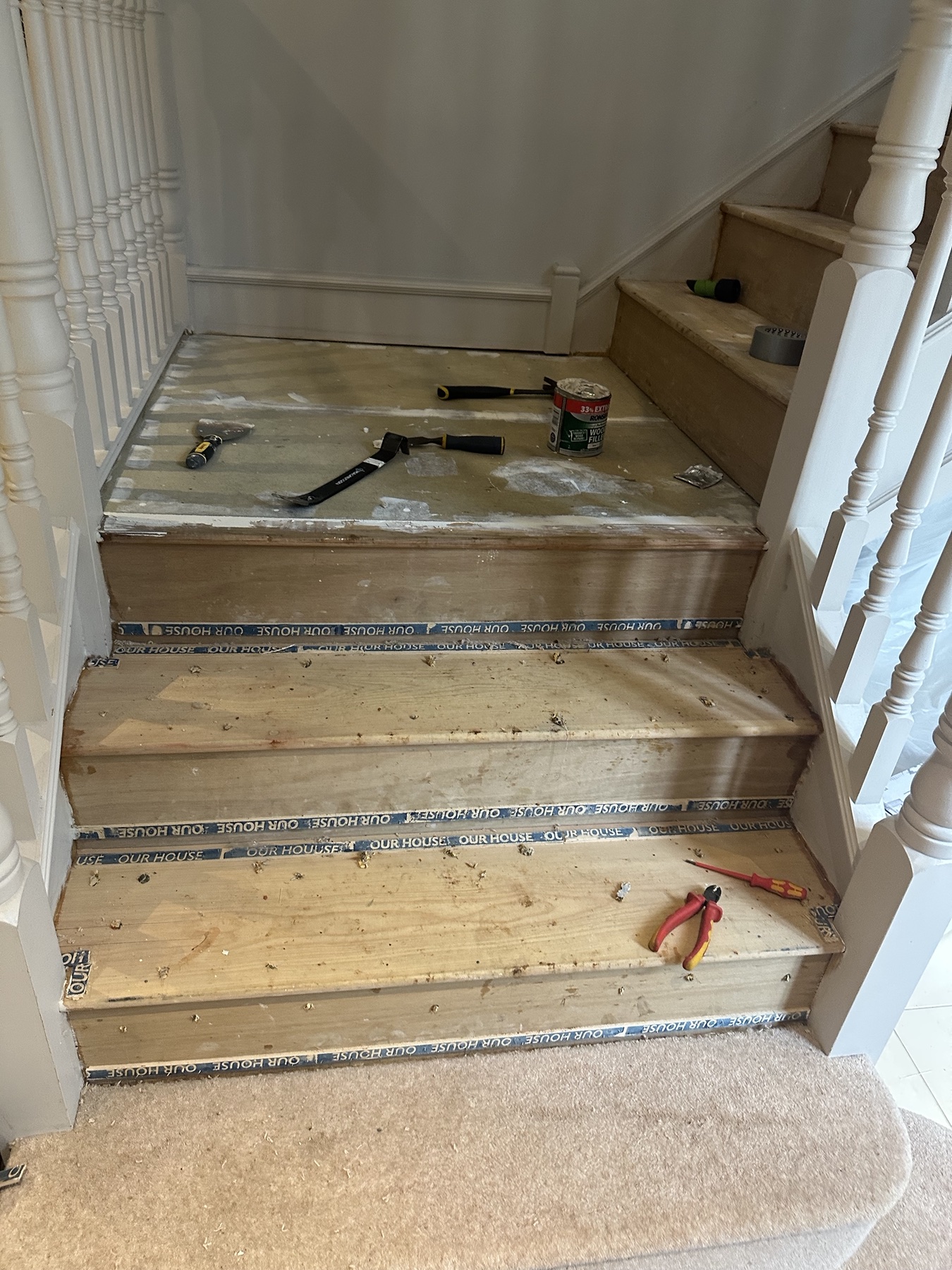 Staircase after old carpet was removed ready for preparation